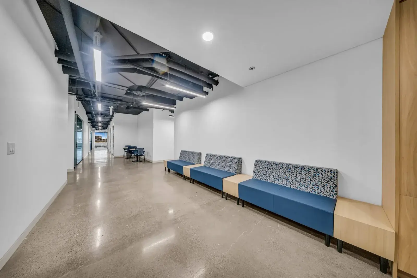 Bright, glazed lounge corridor at Workplace K, 1940 Eglinton Ave, Scarborough